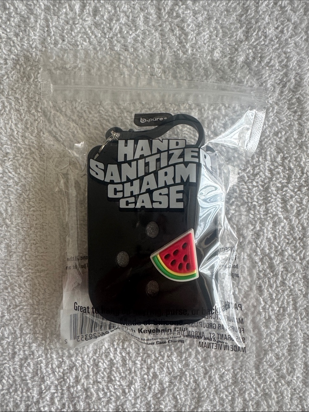 B. Pure Black Hand Sanitizer Charm Case with Watermelon Accent